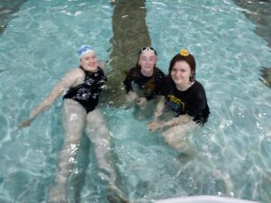 3 kids in a pool