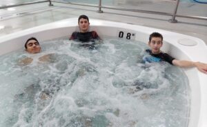 3 kids in a hot tub