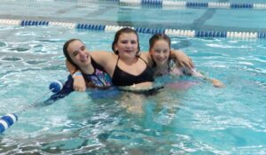 3 kids in a pool
