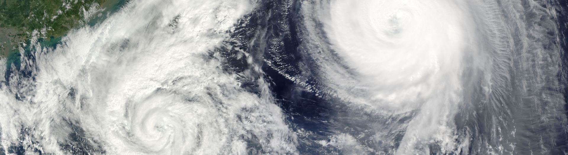 Satellite image of two hurricanes in close proximity.